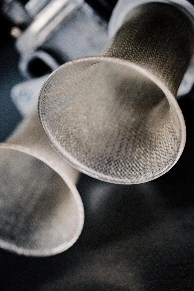 Fine mesh on the intake trumpets